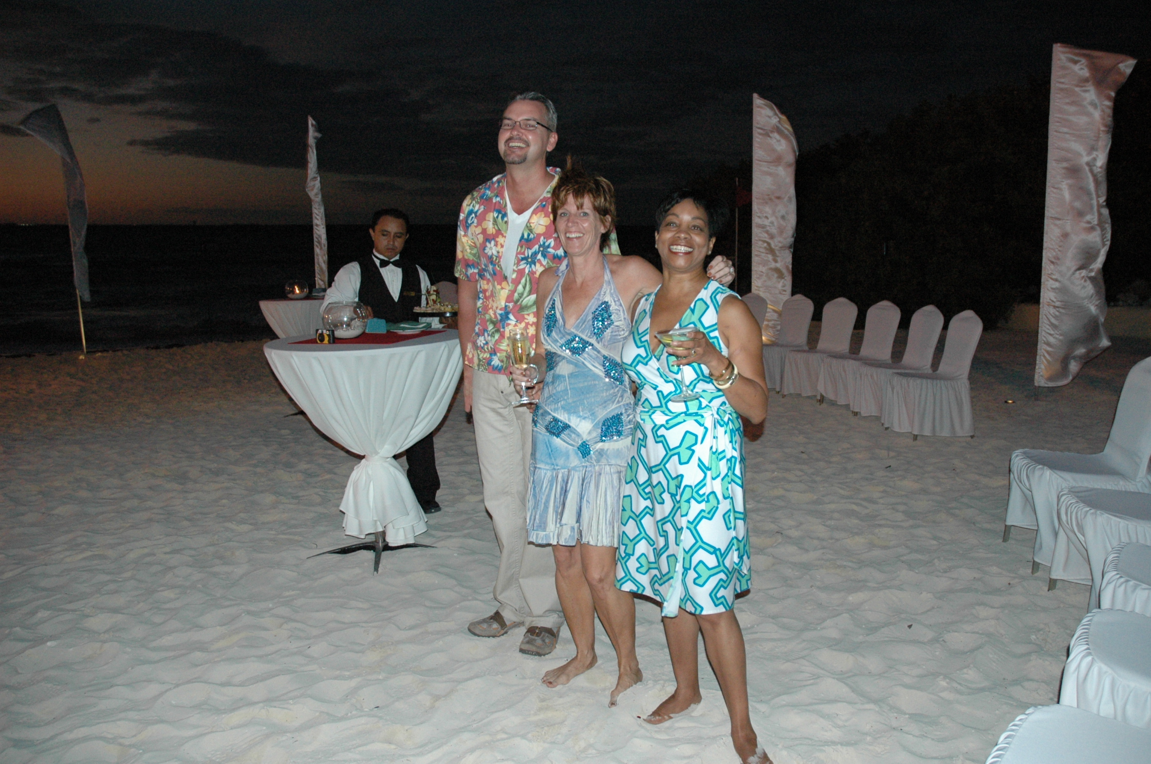 Tim, Jytte, and Jackie model the perfect Cancun party attire.
